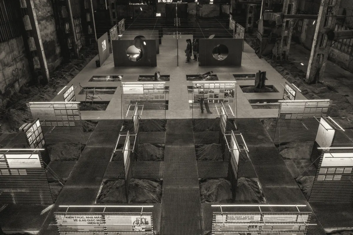 The Grid: walkways of steel grating and lit panels inside the Gia Lâm train factory, Hanoi