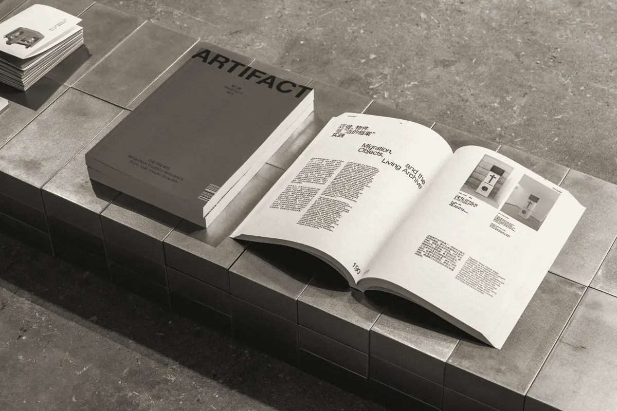 Issue No. 2, closed and open, on a steel stool